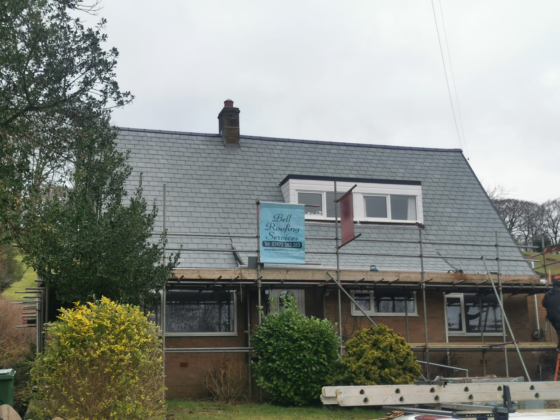 Completed slate roof replacement at a detached dormer bungalow in Brampton