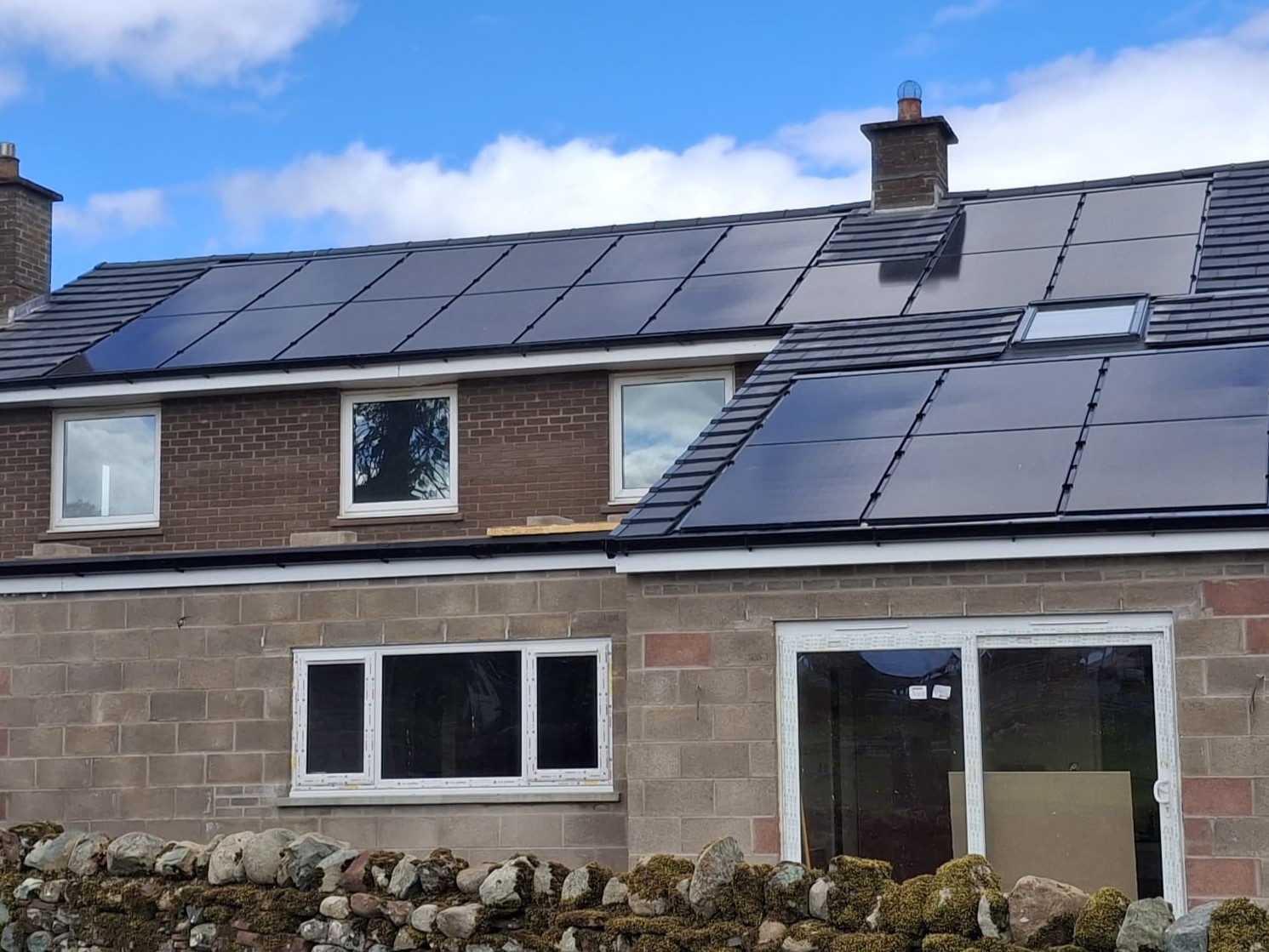 Image showing a completed tiled roof installed by Stuart